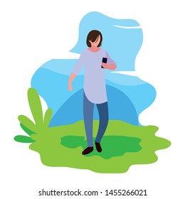 man using smartphone in the landscape