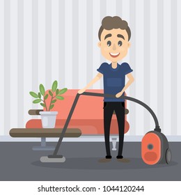 Man vacuum cleaning at home. Man doing household.