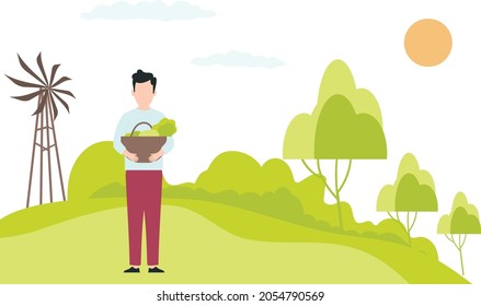 A man with a vegetable bucket standing in an agriculture land.