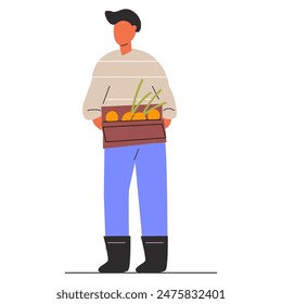 A man with vegetables in a box. Harvest.