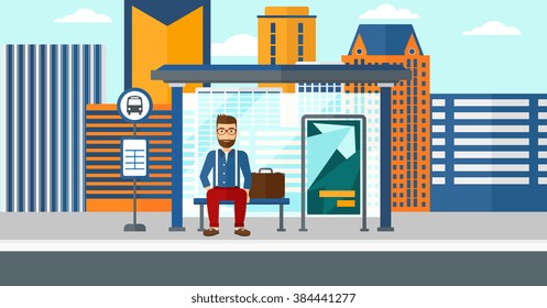 Hombre esperando el autobús.