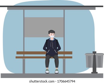 A man is waiting for bus in quiet bus stop