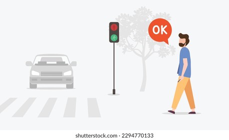 
Man waiting to cross the crosswalk
