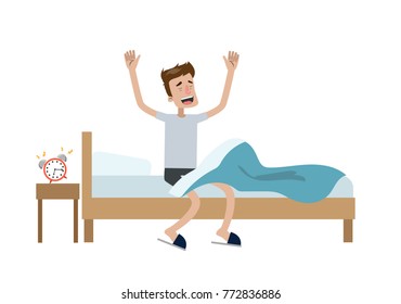 Man waking up in the bed and stretching.