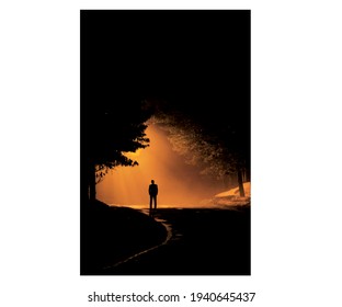 Man walking alone on night misty road