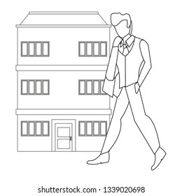 man walking building
