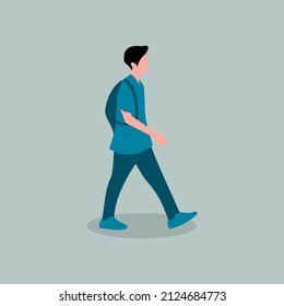 a man is walking on a blue background