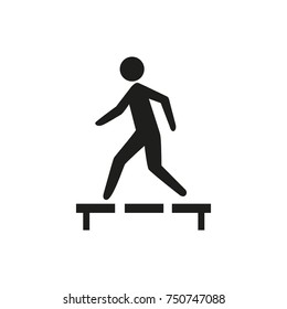 Man walking on footbridge icon