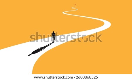 A man walking on a winding road towards the light at the end of the path