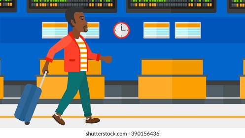 Man walking with suitcase.