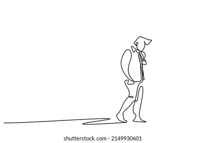 A man walking thoughtfully alone, looking at the ground outside. fired person walking sadly