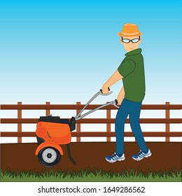 Der Mensch mit Wanderschlepper arbeitet an Ort und Stelle