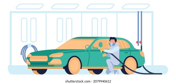 Man washing car at service. Worker in uniform cleaning vehicle