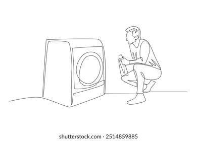 Man washing clothes in washing machine. Doing house chores concept one-line drawing