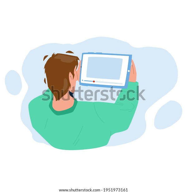 Man Watching Video On Tablet Digital Device\
Vector. Young Boy Watching Video On Electronic Gadget. Character\
Watch Online Movie Stream Or Film On Mobile Media Technology Flat\
Cartoon Illustration