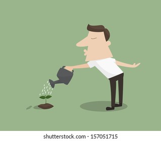 A Man watering a plant