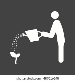 Man Watering Plant