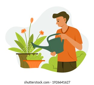 Man is Watering the Plants in the Garden.