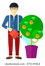 Man watering tree with light bulbs.