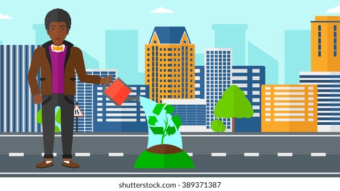 Man watering tree with recycle sign instead of crown.