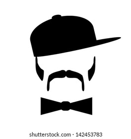 man wearing baseball cap and bow tie