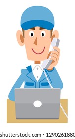 A man wearing Blue working clothes operates a computer while calling