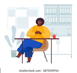 Man wearing casual clothes sitting at his empty office desk. Break time worker sitting drinking coffee resting. Businessman came to meeting with a partner waiting him in the reception room