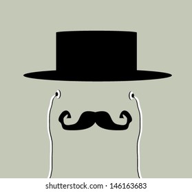 man wearing earphones and vintage hat