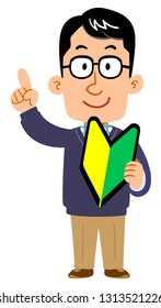 A man wearing eyeglasses putting up the index finger holding a beginner's mark