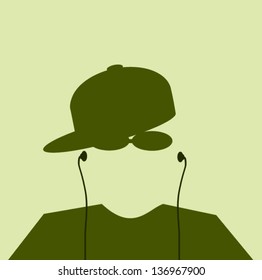 man wearing hat sideways and earphones with sunglasses