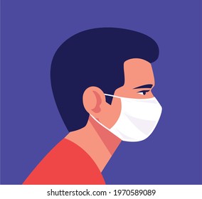 A man is wearing a mask. From side angle