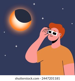 Man wearing safety glasses watch a partial solar eclipse