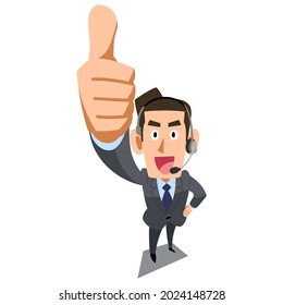 A man wearing a suit wearing a headset to thumbs up