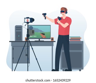 Man wearing virtual reality goggles while recording himself for his online video channel
