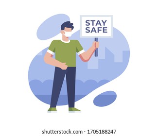 A Man Wears A Mask And Holds A Board That Says Stay Safe