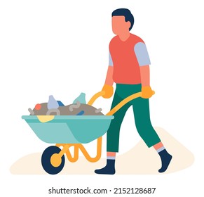 Man wheelbarrow with full of trash. Volunteer taking garbage