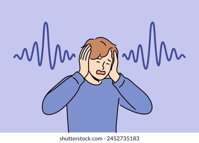 Man who has lost hearing clasps hands and screams, experiencing panic due to symptoms of terrible disease. Guy with good hearing suffers from loud music and noise, feels headache and migraine