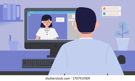 A man who is having a conference with a remote video chat.