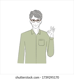 A man who makes a circle with his fingers and smiles