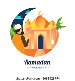 A man who pray in front of mosque with bic Crecent for ramadan Season Greeting 