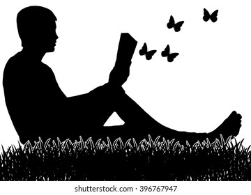 The man who is sitting on the grass and reading a book.