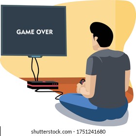 a man who is sitting and playing his game