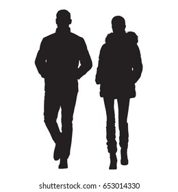 Man And Wife Are Dressed In Winter Clothes. Walking People, Young Couple. Vector Silhouettes