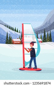 man windboarding windsurfing on snow over small village houses winter snowy mountains hills fir tree forest landscape background vertical flat