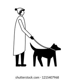 man with winter clothes walking her dog