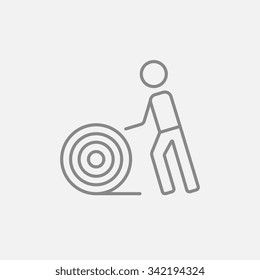 Man with wire spool line icon for web, mobile and infographics. Vector dark grey icon isolated on light grey background.