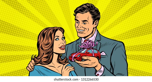 man and woman, car gift. Pop art retro vector illustration drawing kitsch vintage