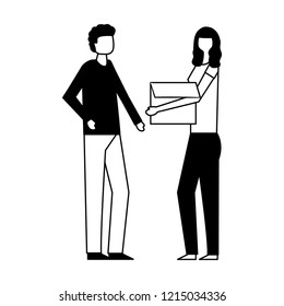 man and woman carrying cardboard box