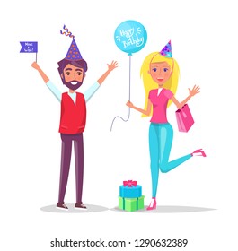 Man and woman in cartoon cone shape hats greeting everyone isolated on backdrop with confetti. Male with flag and woman with balloon on birthday party