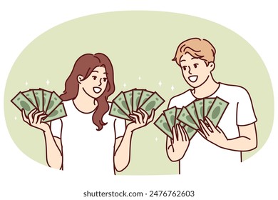 Man and woman with lot of cash in hands brag about money they earned from business or winning jackpot in lottery. Couple rich guys girls with money want to invest savings or invest in startup